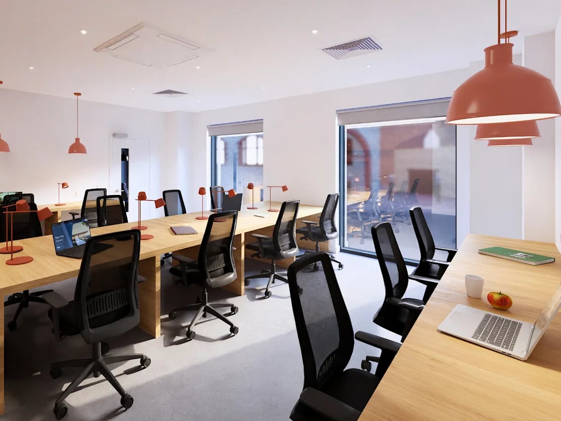Wooden desks with chairs and laptops study area at Croft Court in Bristol Student Accommodation