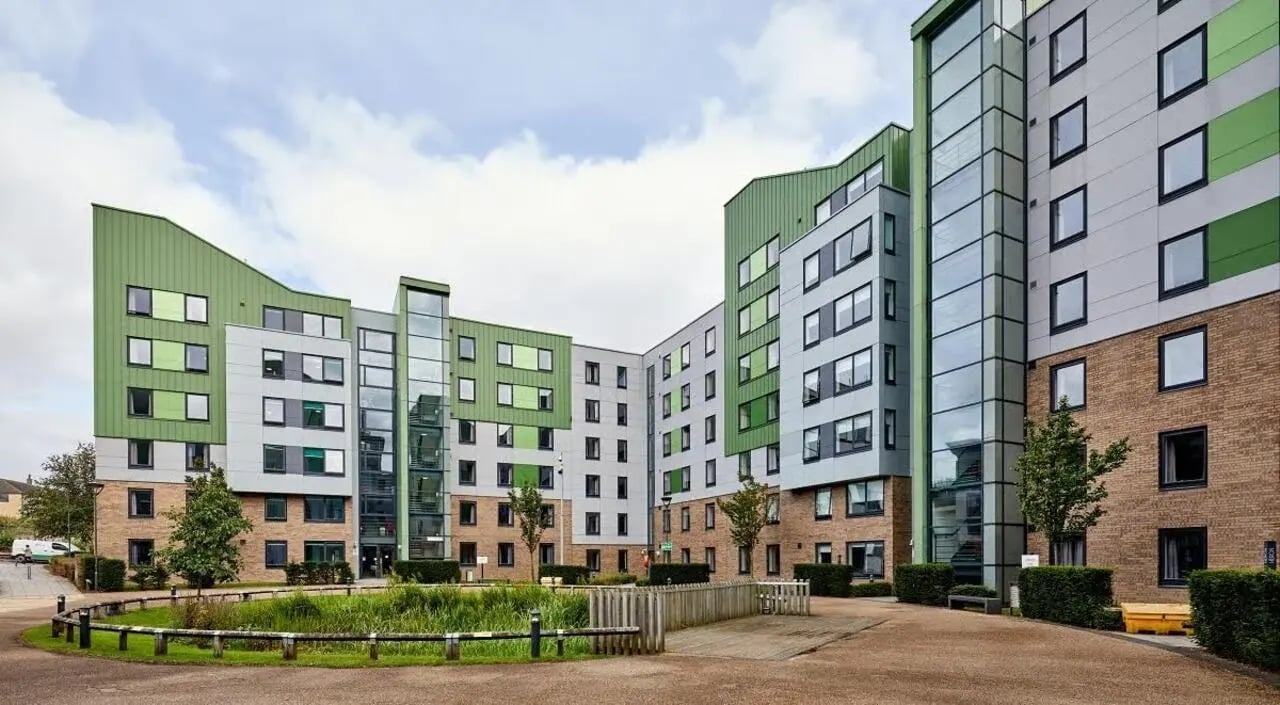 Modern student accommodation building with green accents exterior at The Green in Bradford Student Accommodation