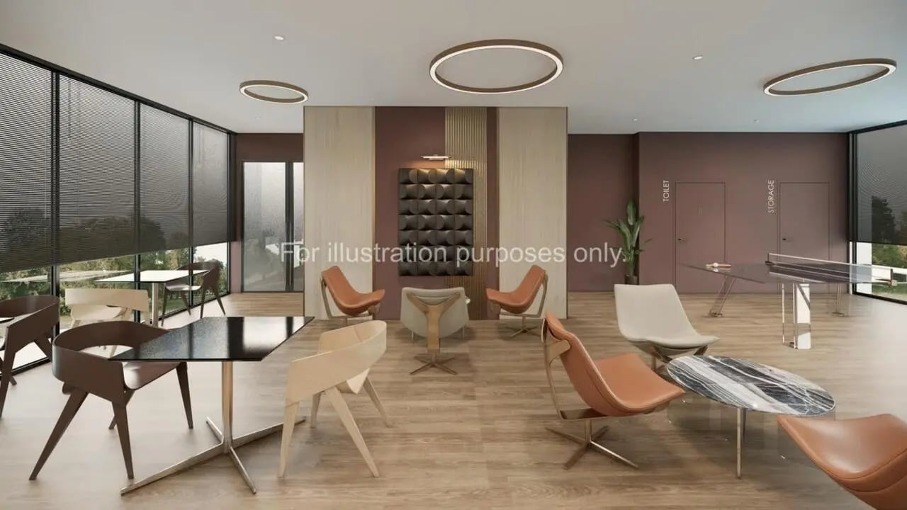 Modern lounge with chairs tables and ping pong table common area at Stellaris in Cambridge Student Accommodation