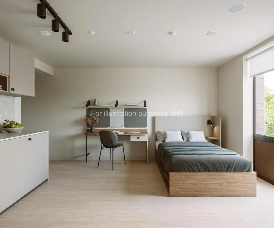 Bed desk chair and cabinets bedroom at Press House in London Student Accommodation
