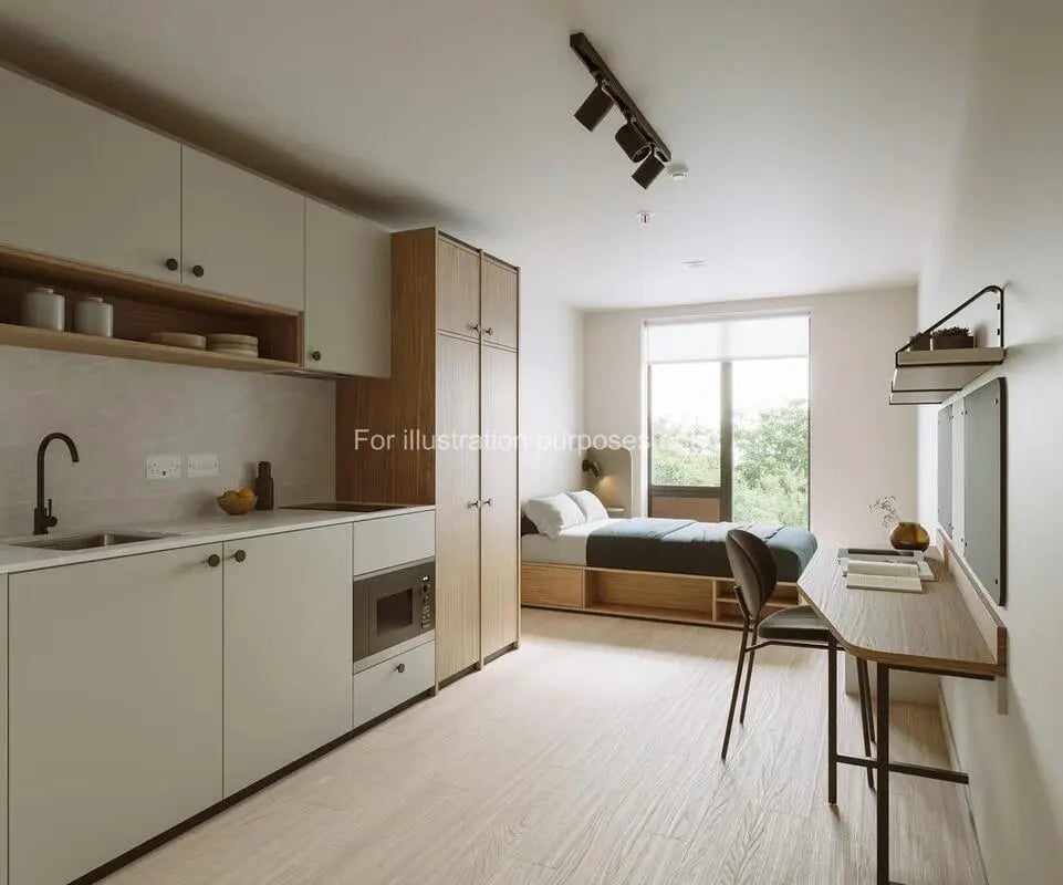 Kitchen bed desk wardrobe studio at Press House in London Student Accommodation
