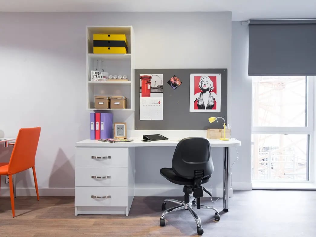 Desk with chair and shelves Study area at Glassyard Building in London Student Accommodation