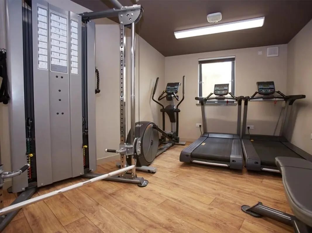 Gym equipment including treadmills and elliptical gym Image Type at Woodside House in Glasgow Student Accommodation