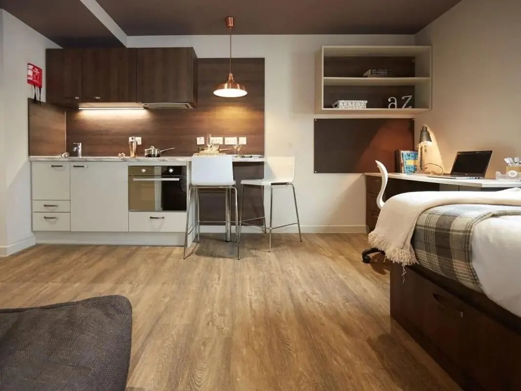 Kitchenette with bed and desk Studio Apartment at Woodside House in Glasgow Student Accommodation