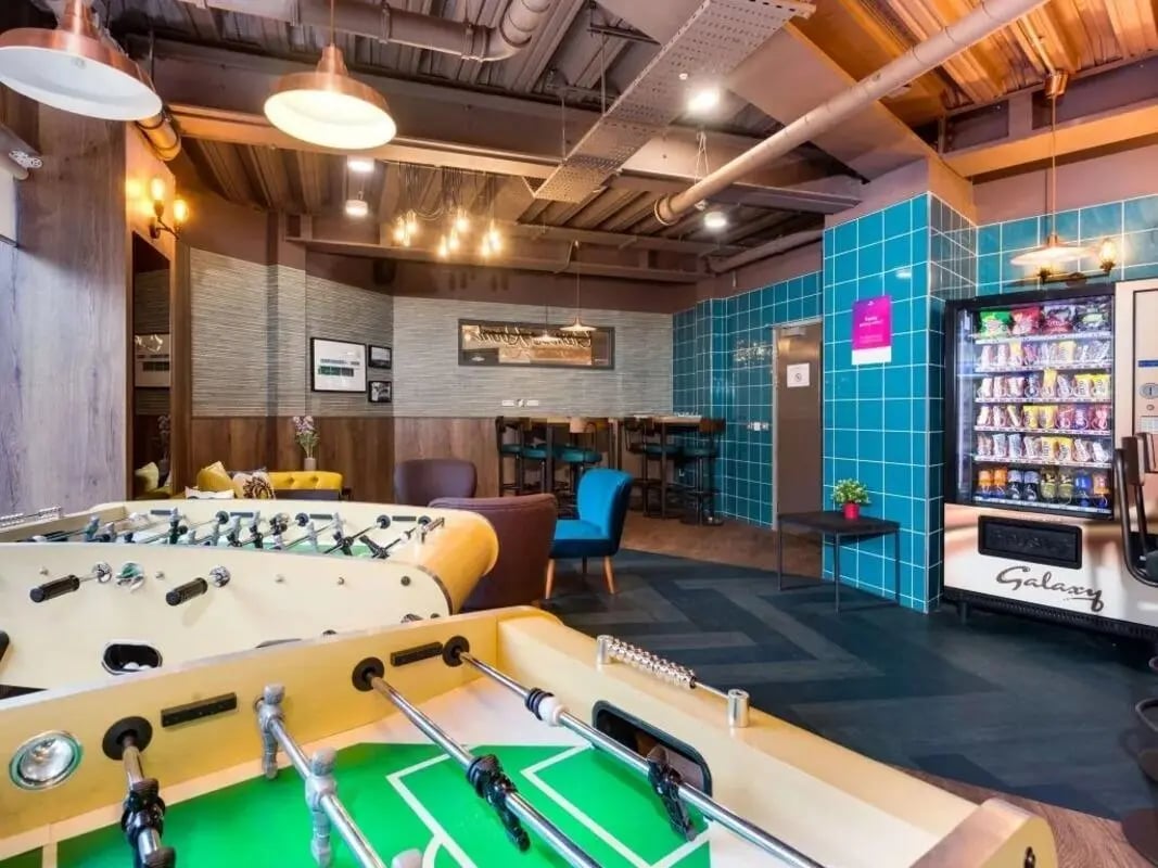 Foosball tables lounge area vending machine common area at Woodside House in Glasgow Student Accommodation