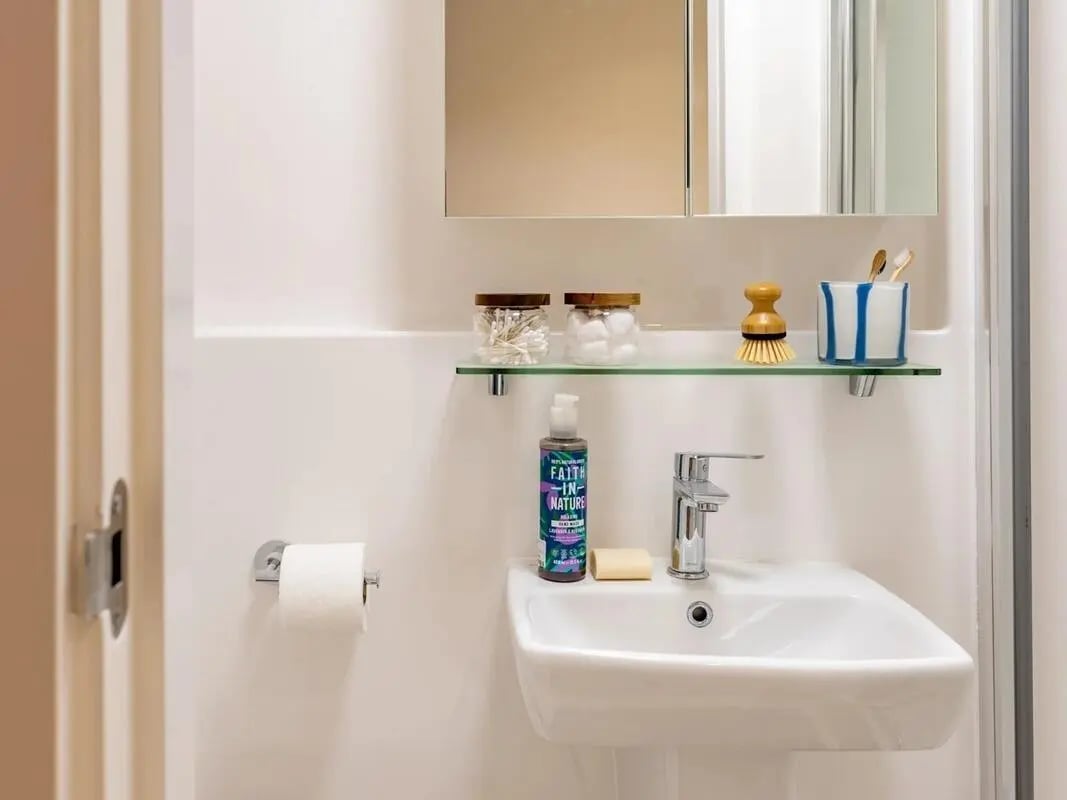Sink toilet roll soap lotion and toiletries bathroom at Glassworks in Bristol Student Accommodation