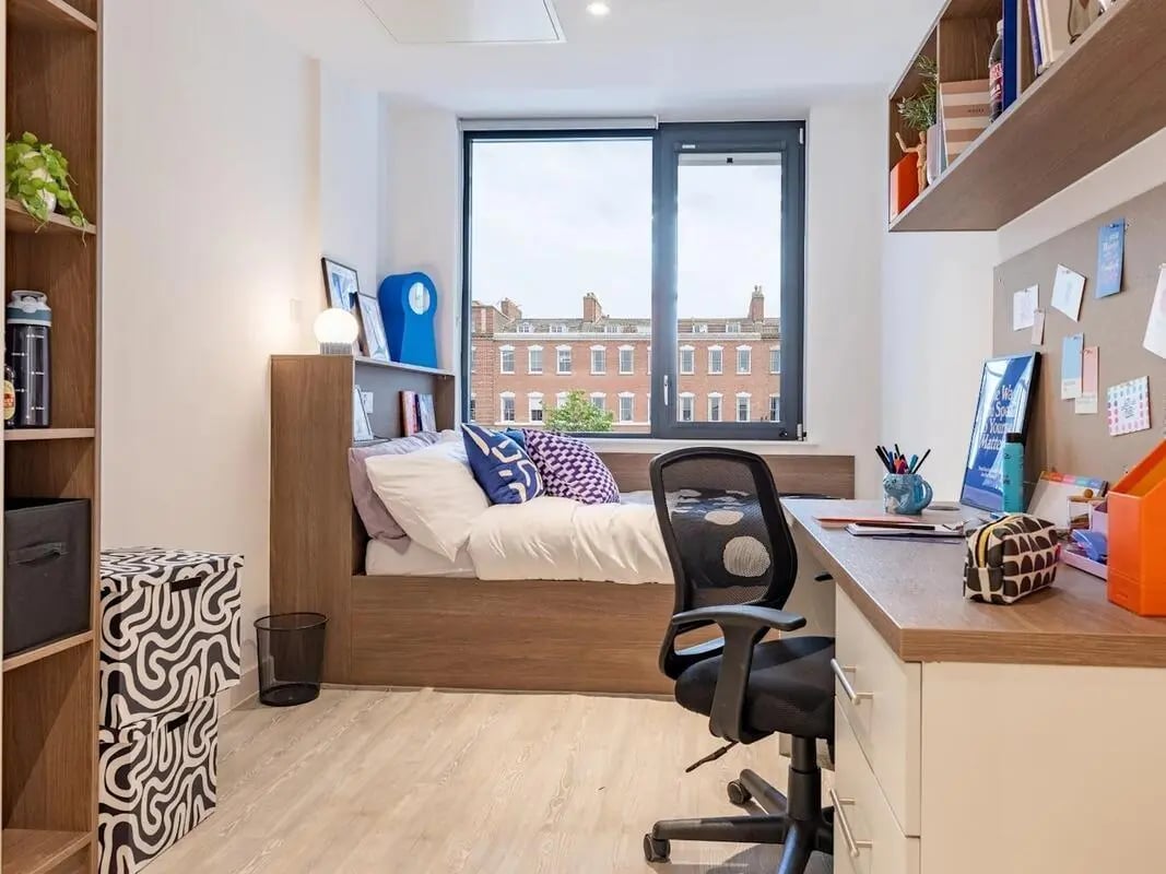 Bed desk chair and shelving study bedroom at Glassworks in Bristol Student Accommodation