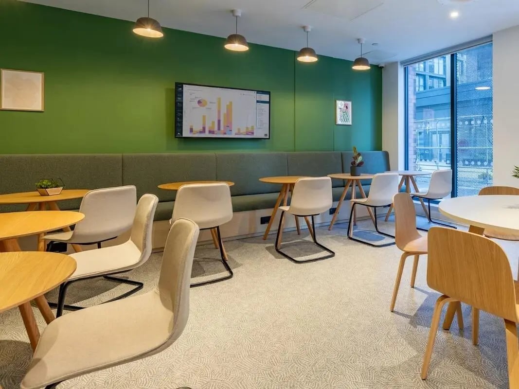 Modern study area with tables and chairs at Glassworks in Bristol Student Accommodation