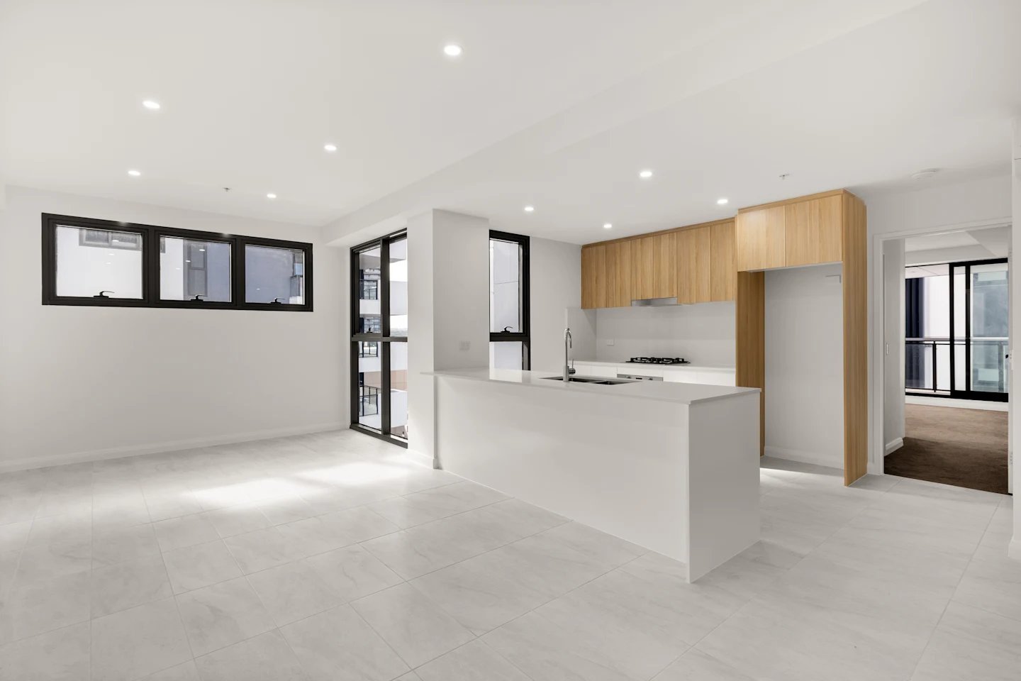 Modern kitchen with island and appliances kitchen at UKO Parramatta Central in Sydney Student Accommodation