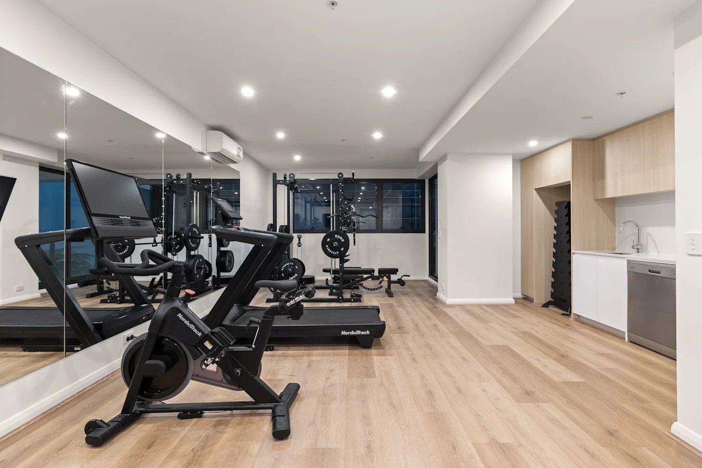 Treadmills exercise bike weights and bench Gym at UKO Parramatta Central in Sydney Student Accommodation
