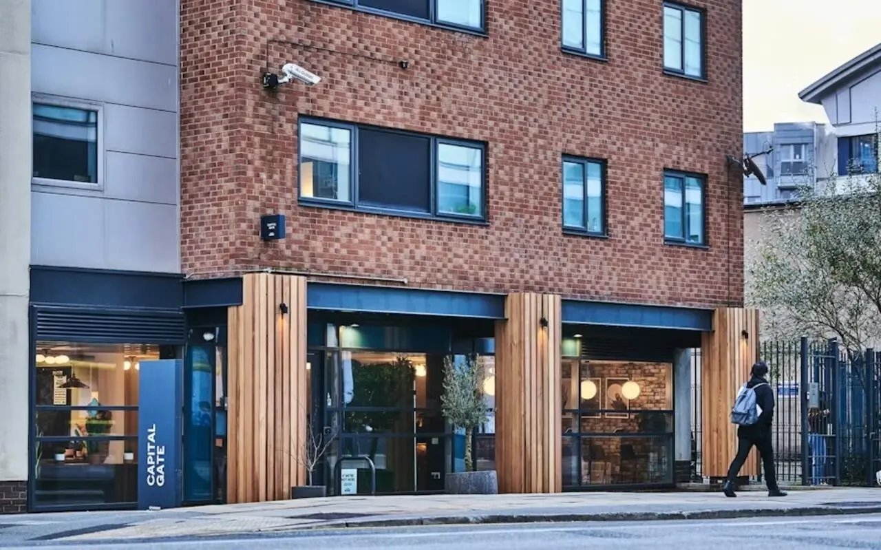 Capital Gate building exterior with brick and wood accents exterior at Capital Gate in Liverpool Student Accommodation