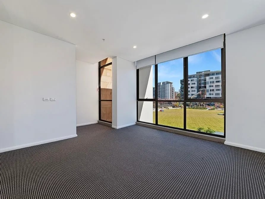 Large window view living room apartment living room at Belong Waterloo in Sydney Student Accommodation