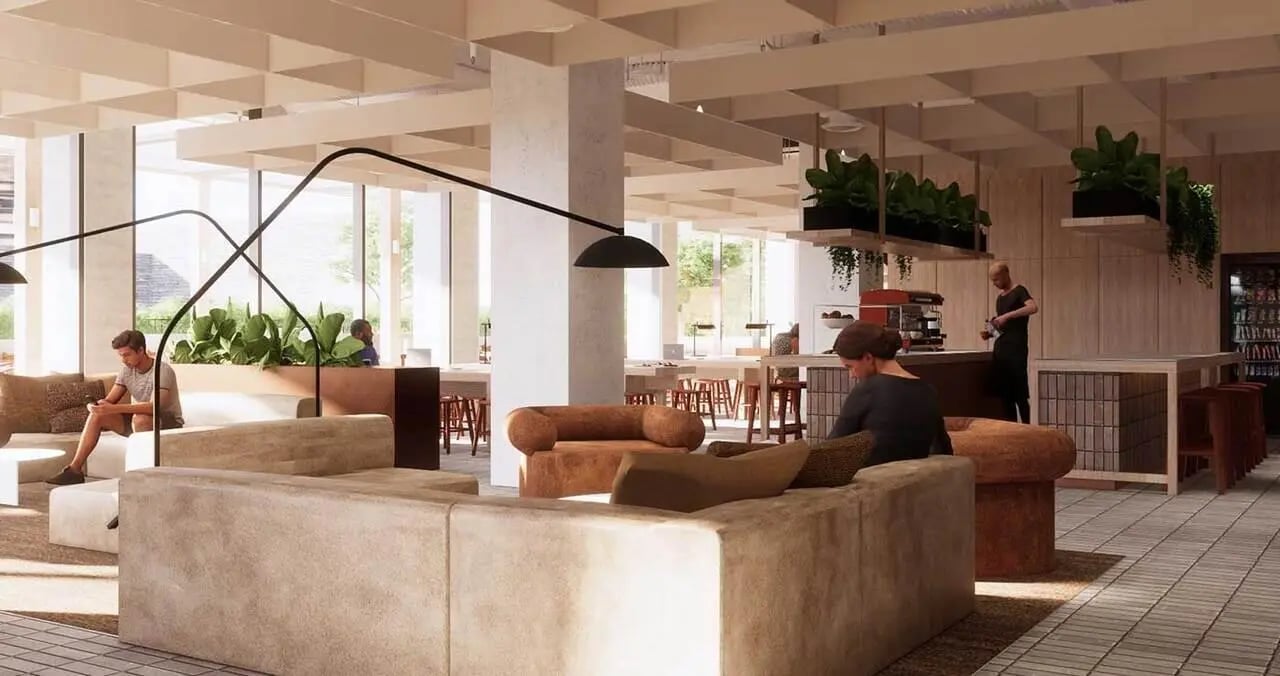 Modern lounge with couches and coffee bar living room at Iglu Waterloo in Sydney Student Accommodation