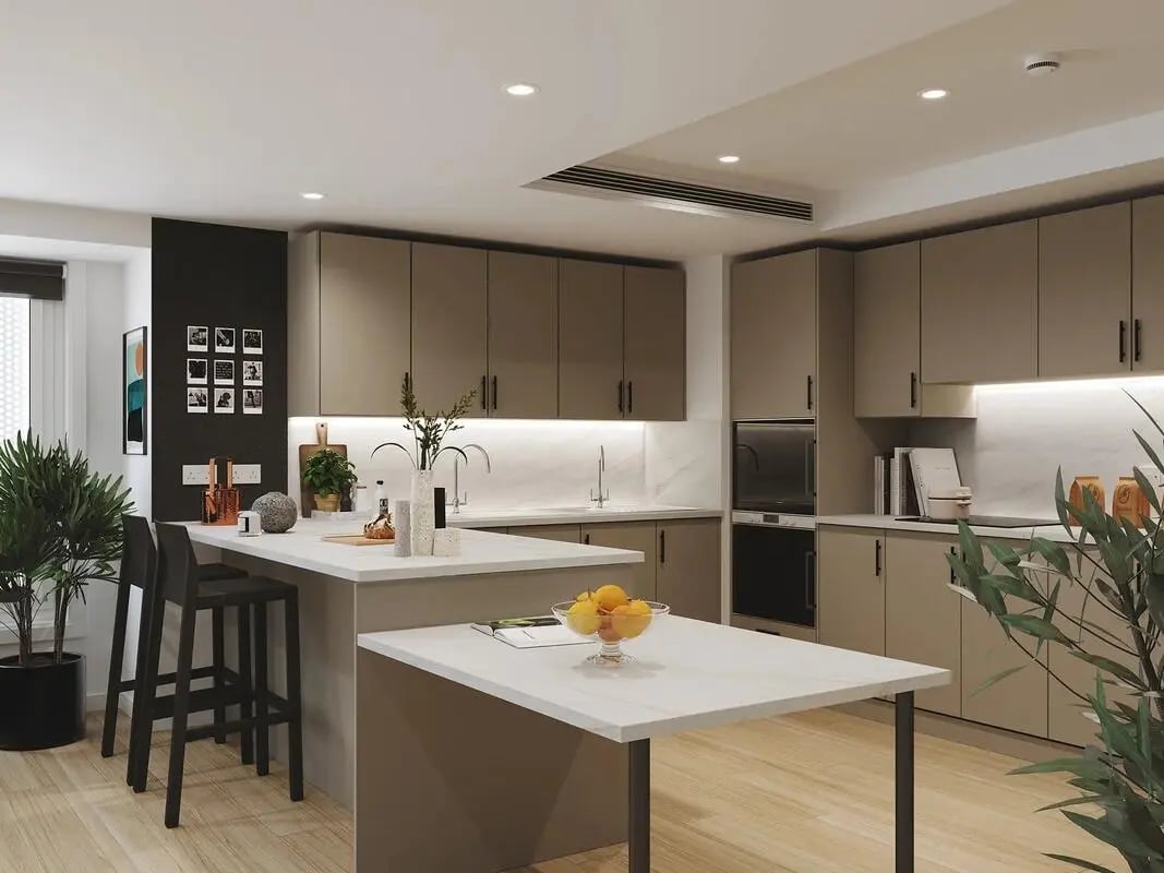 Modern kitchen with island and stools kitchen at Signal House in London Student Accommodation