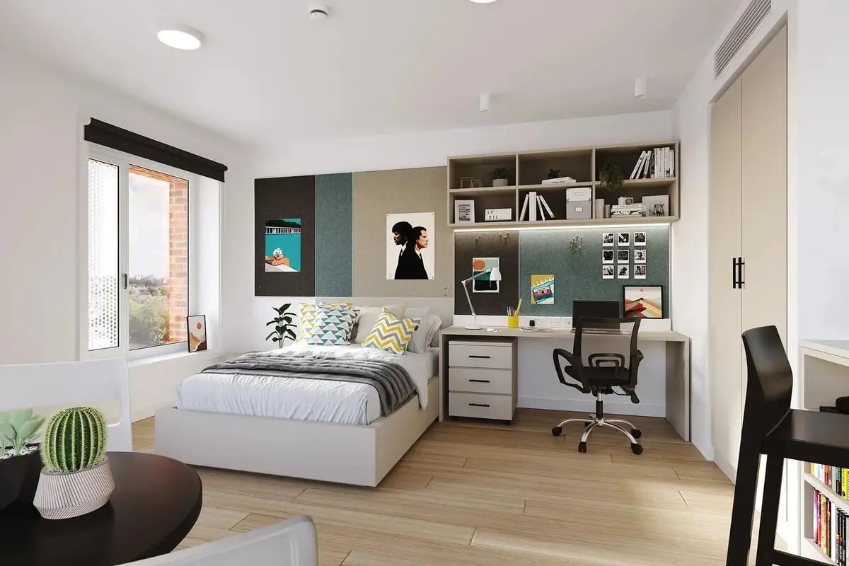 Bed desk shelves and chair bedroom at Signal House in London Student Accommodation