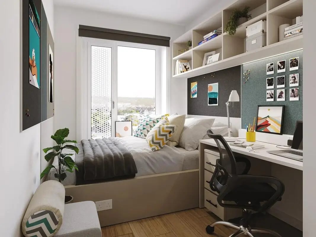 Bed desk and shelves student bedroom at Signal House in London Student Accommodation