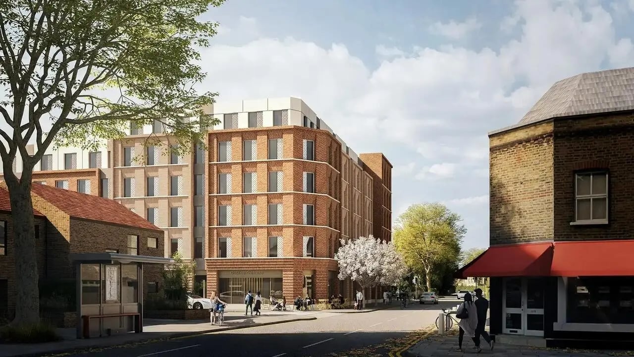 Modern brick building with people and cafes exterior at Signal House in London Student Accommodation