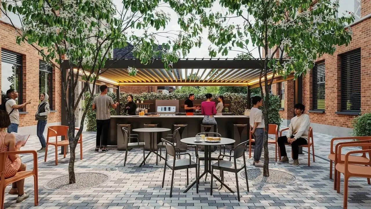Outdoor courtyard with bar and seating exterior at Signal House in London Student Accommodation