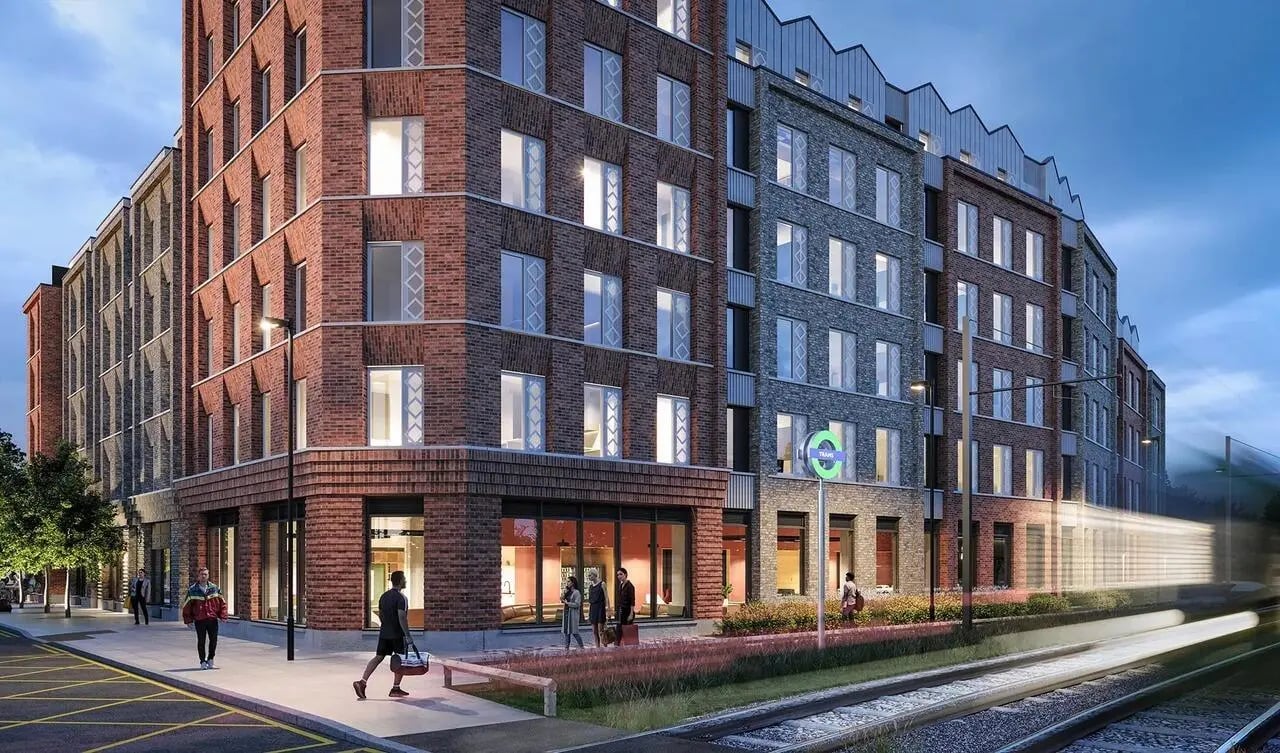 Modern brick apartment building with train tracks exterior at Signal House in London Student Accommodation