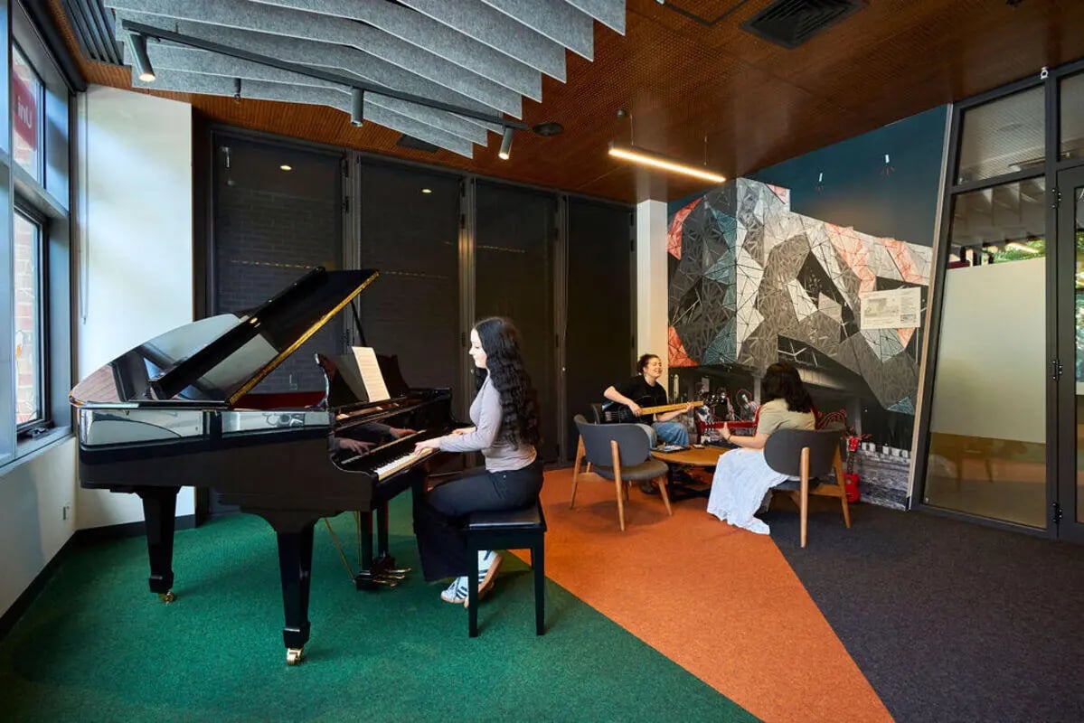 Grand piano and guitars playing area at UniLodge Royal Melbourne in Melbourne Student Accommodation