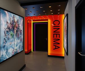 Hallway entrance with movie poster and CINEMA sign Cinema at Iconinc The Bonnie in Glasgow Student Accommodation