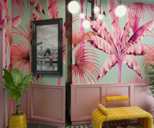 Tropical wallpaper framed art yellow bench living room at Iconinc The Bonnie in Glasgow Student Accommodation