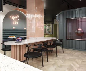 Modern communal space with seating and laptop study area at Iconinc The Bonnie in Glasgow Student Accommodation