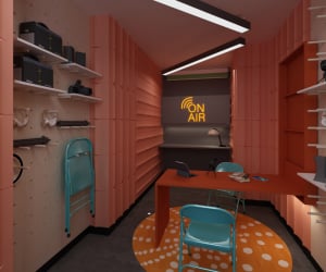Desk chairs shelves and 'On Air' sign study area at Iconinc The Bonnie in Glasgow Student Accommodation