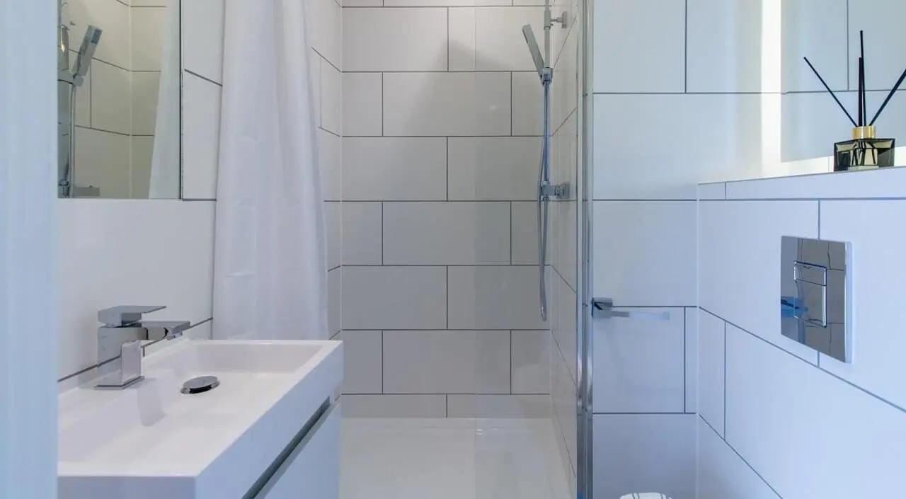 Sink shower and toilet cistern bathroom at AXO Seven Sisters in London Student Accommodation