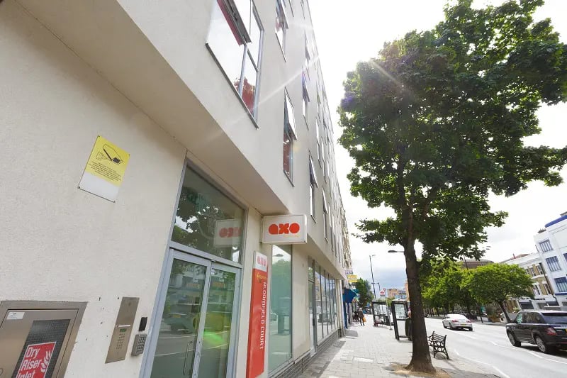 AXO signage glass doors and windows exterior at AXO Islington in London Student Accommodation