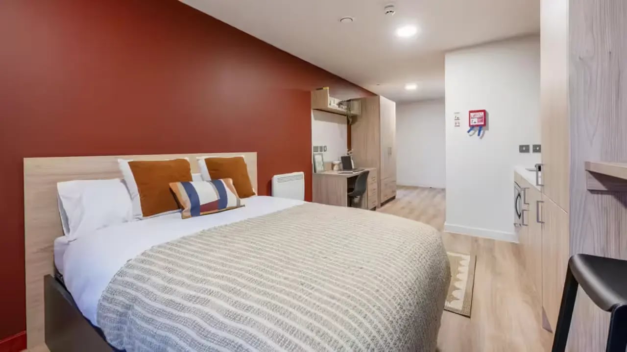 Bed desk wardrobe laundry unit bedroom at Haymarket Yards in Edinburgh Student Accommodation
