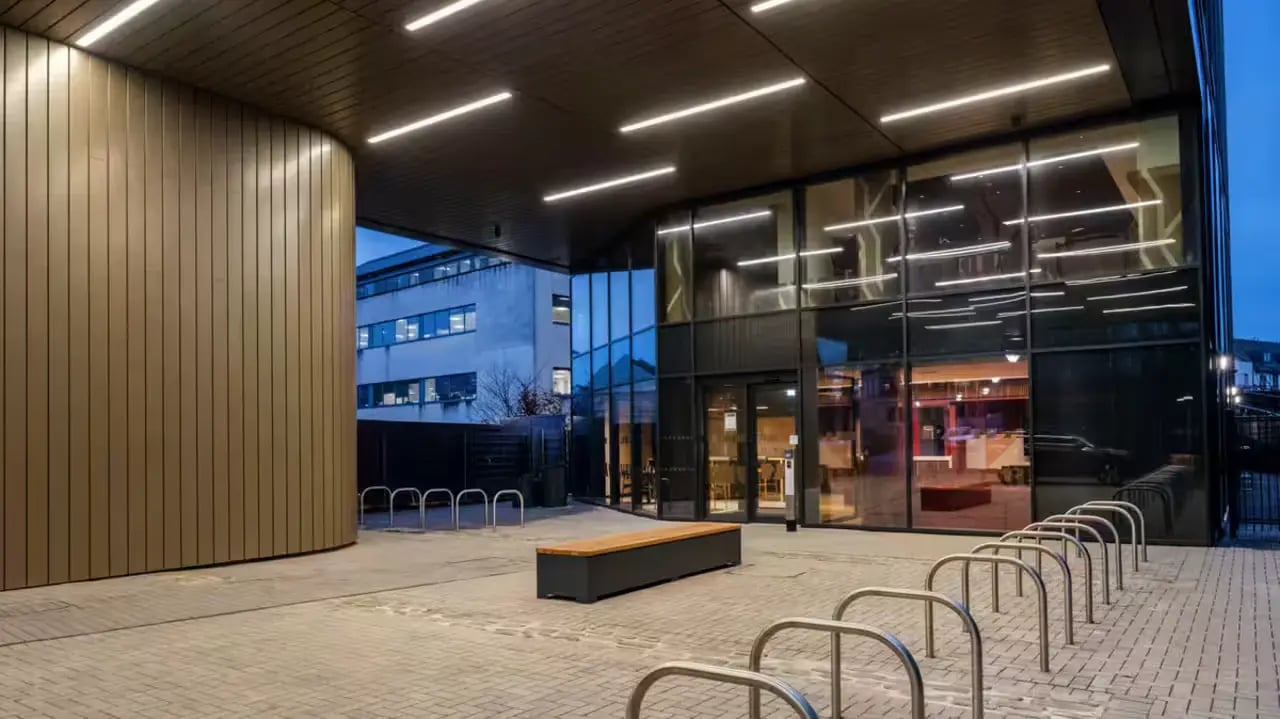 Modern entrance with bench bike racks exterior at Haymarket Yards in Edinburgh Student Accommodation