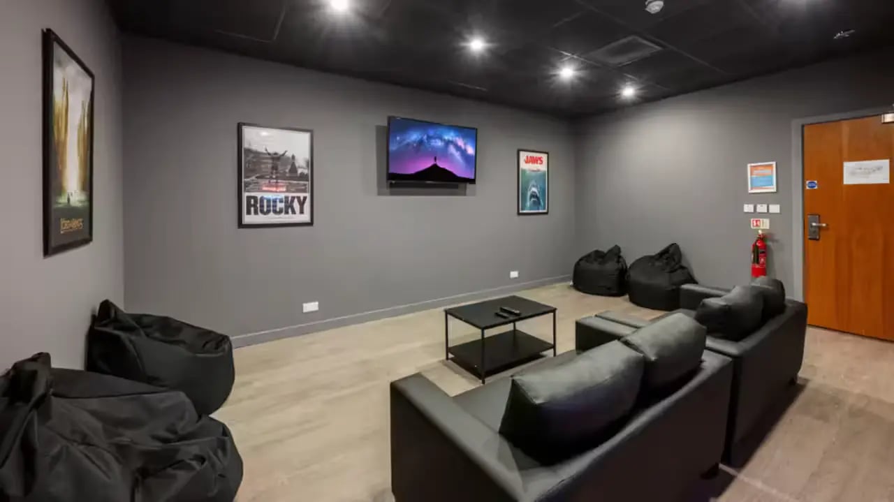 Sofa beanbags tv and posters common room at Gallery Apartments in Glasgow Student Accommodation
