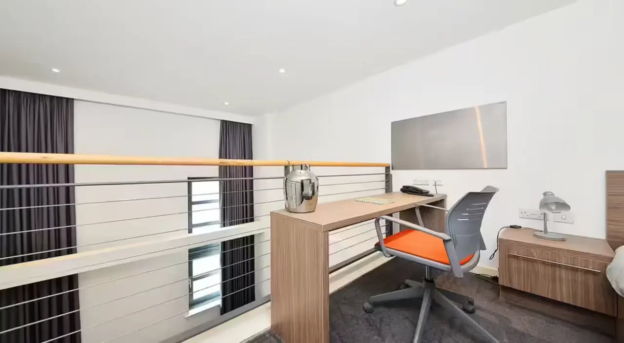 Desk chair lamp and vase study area at Gallery Apartments in Glasgow Student Accommodation
