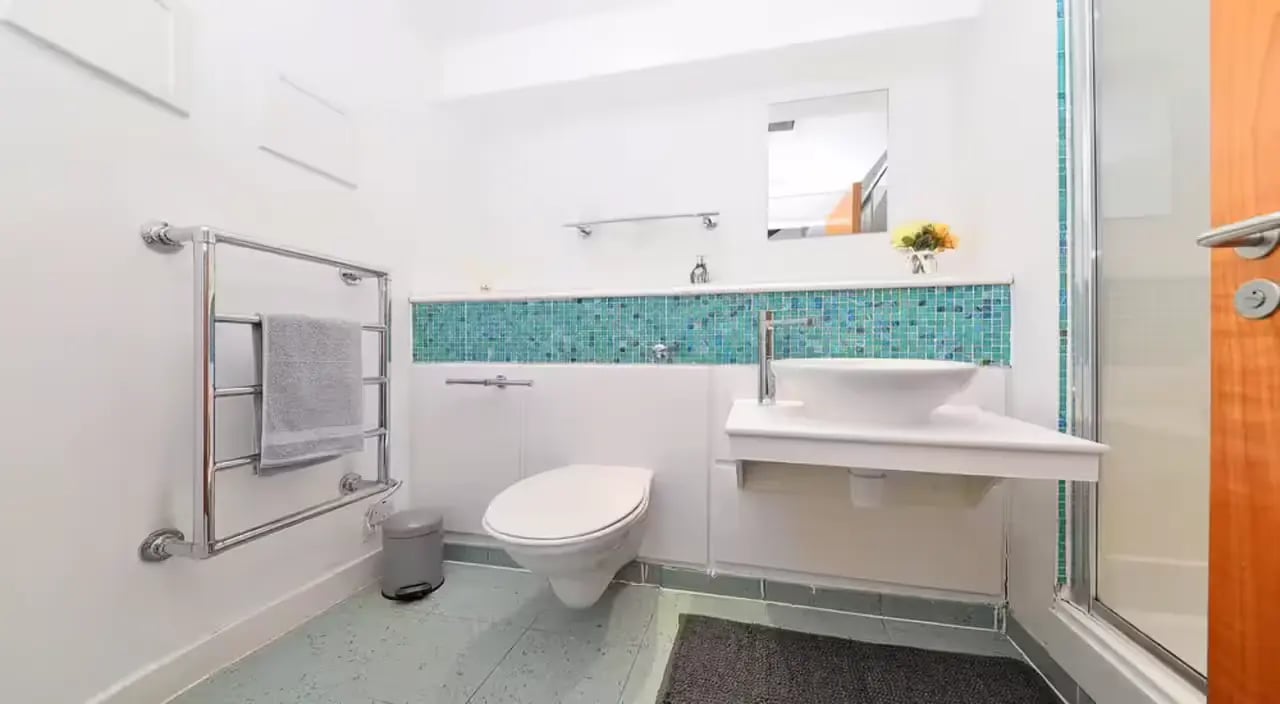 Toilet sink towel rail and shower bathroom at Gallery Apartments in Glasgow Student Accommodation