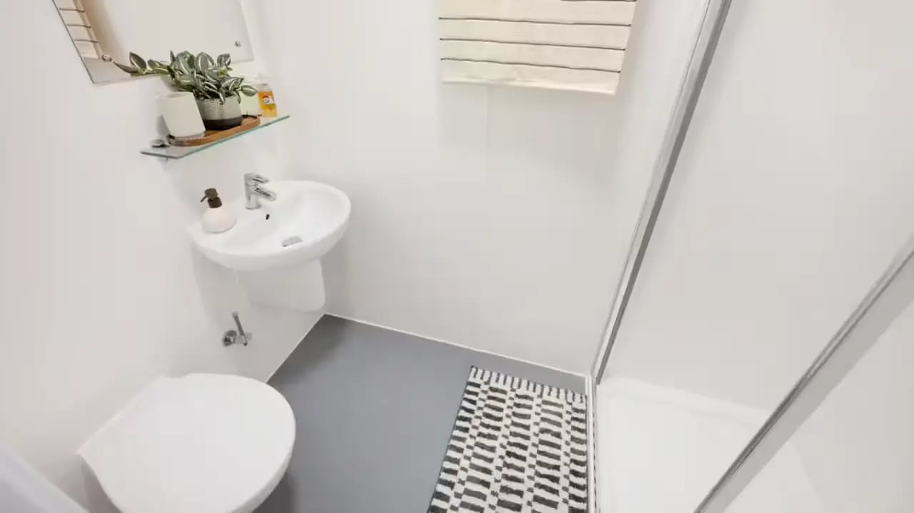 Toilet sink and shower enclosure bathroom at St Vincent Studios in Glasgow Student Accommodation