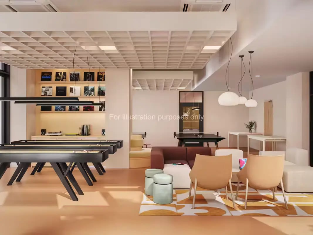 Shuffleboard tables pool table and seating lounge area at St Vincent Studios in Glasgow Student Accommodation