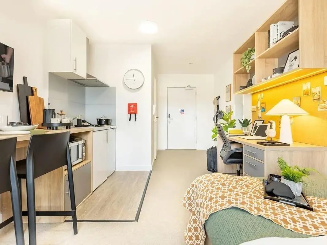 Kitchen desk area and bed studio room at Globe Works in Birmingham Student Accommodation