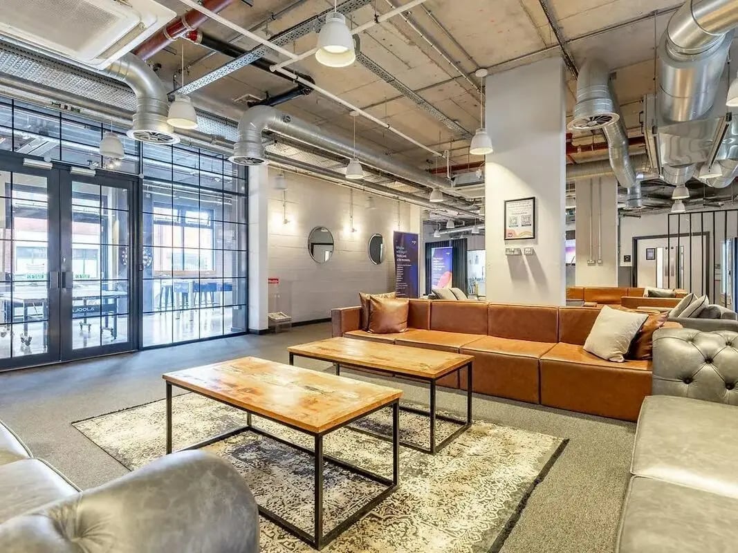 Sofa tables rug living room interior at Globe Works in Birmingham Student Accommodation