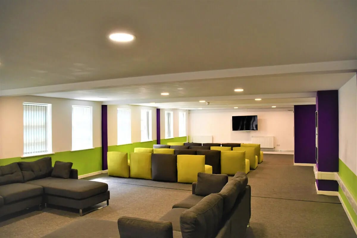 Sofas and beanbag seating in a common room at Tudor Studios in Leicester Student Accommodation