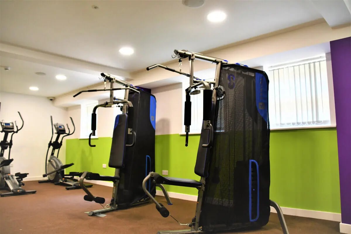 Weight machines and ellipticals gym area at Tudor Studios in Leicester Student Accommodation