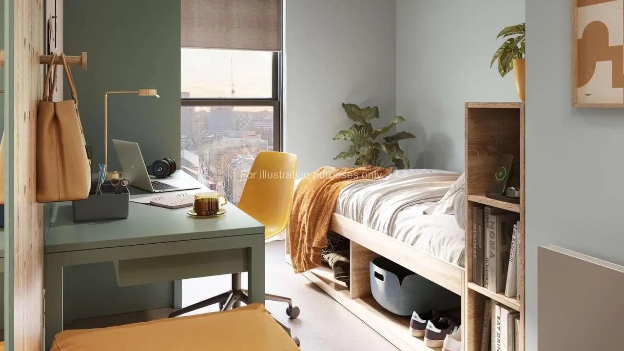 Desk bed plants and shelving student room at The Store House in Leeds Student Accommodation
