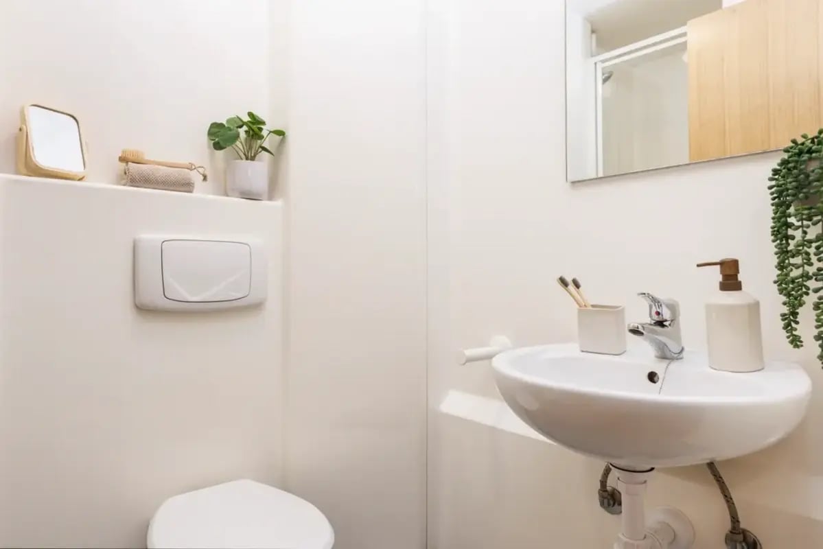 Sink toothbrush holder soap dispenser toilet bathroom at The Anvil in Sheffield Student Accommodation