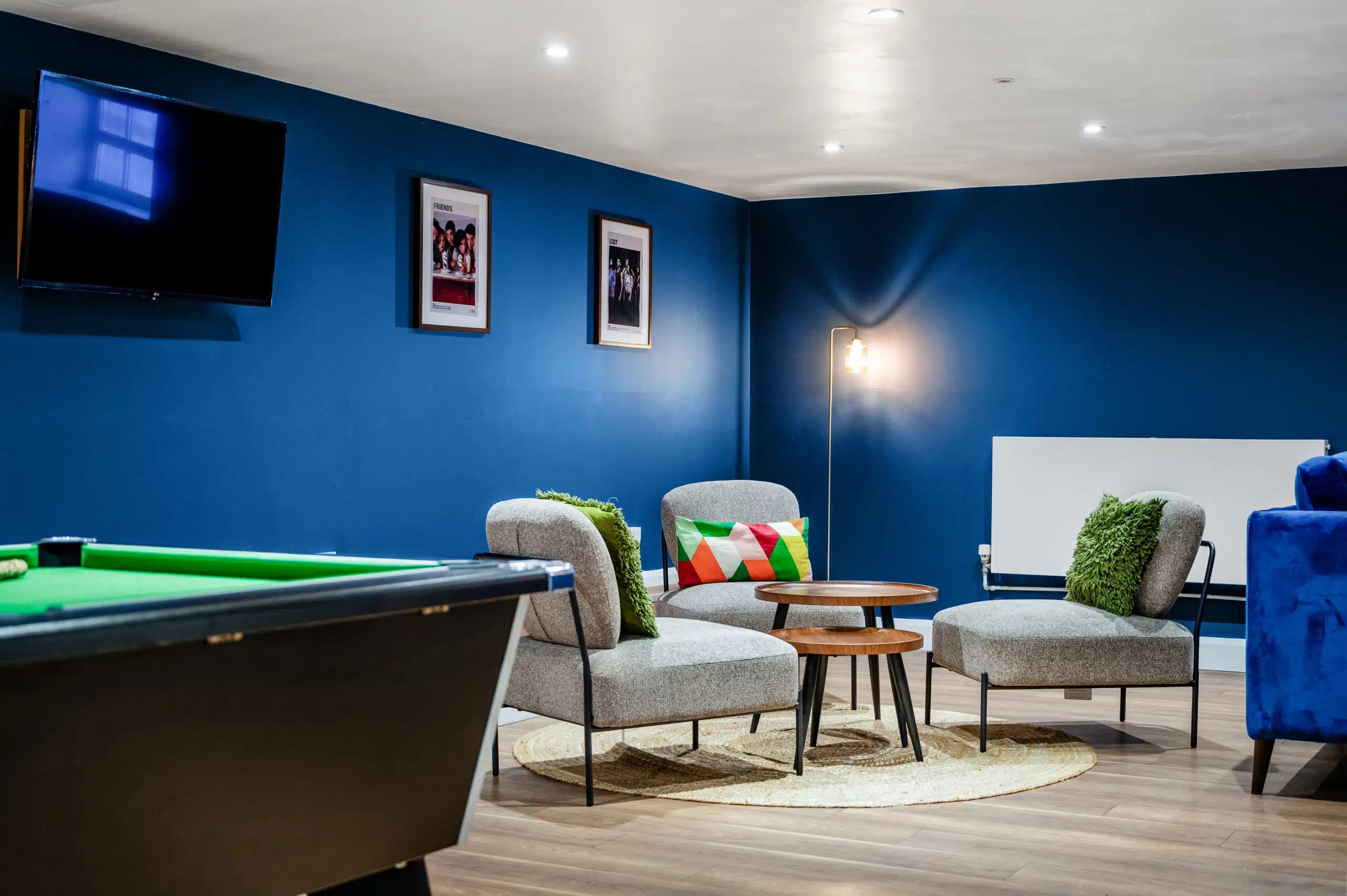 Pool table chairs and tables living room at AXO Waterloo in London Student Accommodation