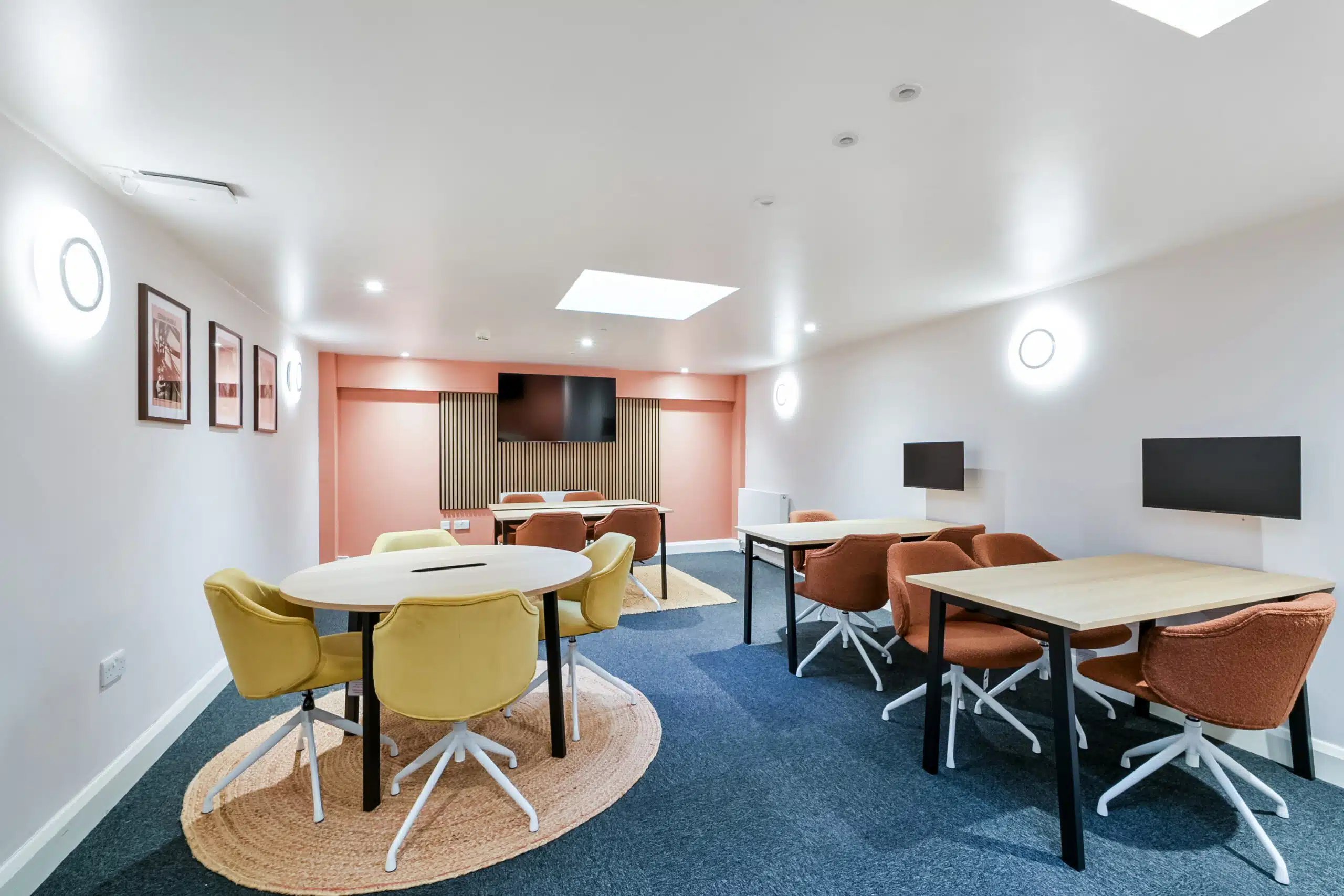 Tables and chairs communal study area at AXO Waterloo in London Student Accommodation