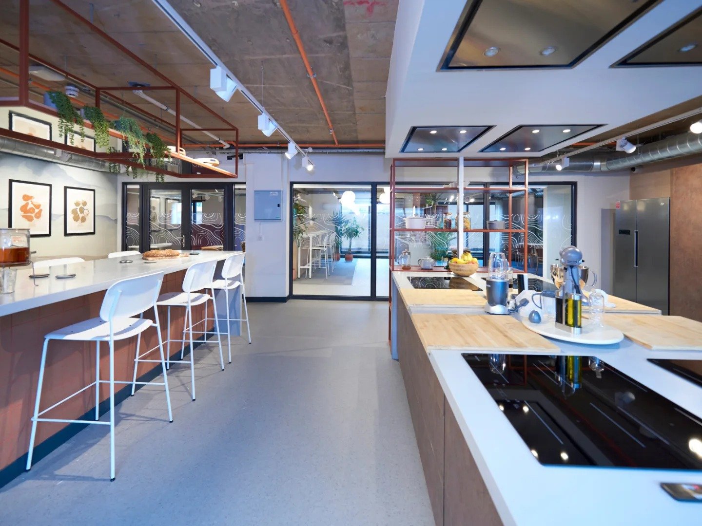 Modern kitchen with bar stools and appliances kitchen at The Gorge in Exeter Student Accommodation