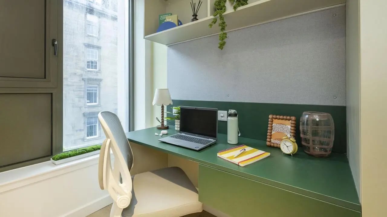 Desk with laptop chair and window study area at St Vincent Studios in Glasgow Student Accommodation