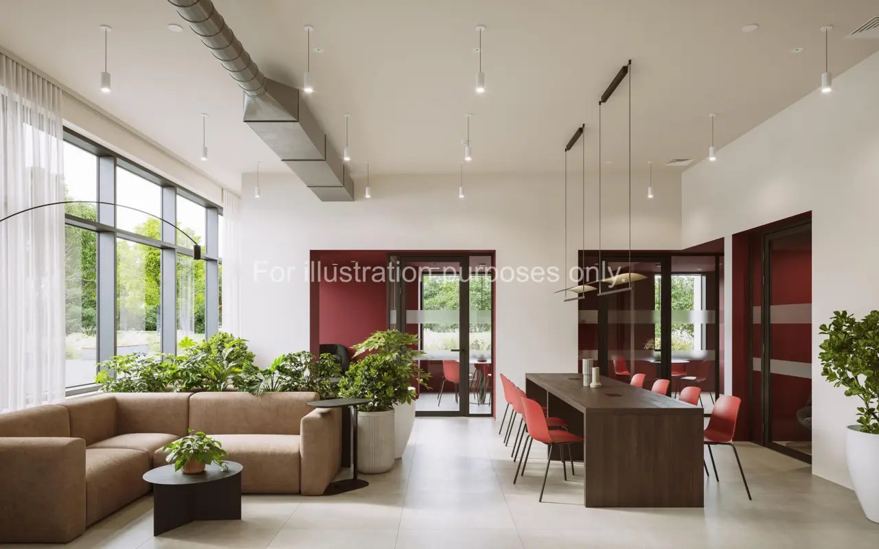 Sofa plants dining table chairs common area at Press House in London Student Accommodation