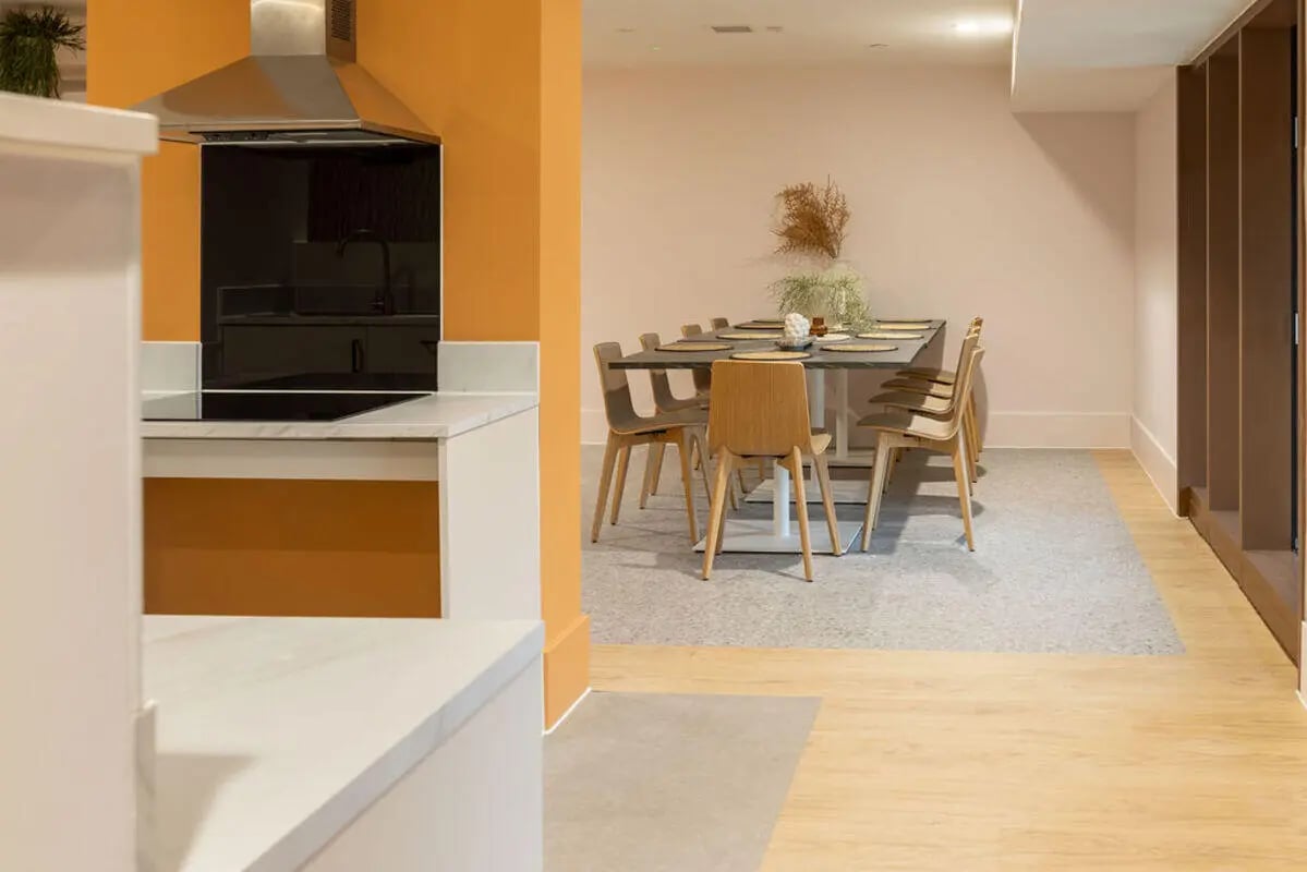 Kitchen island with stove and dining area living room at Yugo Crown Place in Birmingham Student Accommodation
