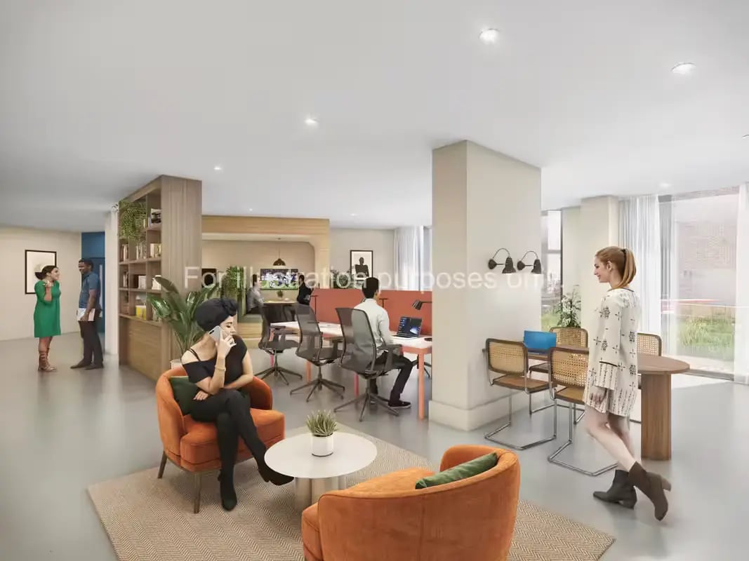 Office area with desks chairs and people living area at The Quarter House in Bristol Student Accommodation